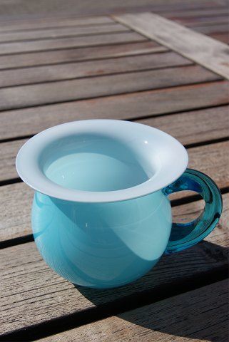 Lightblue glass cup with handle from Sweden