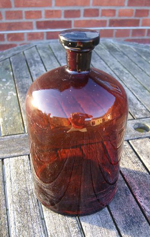 Large and well-maintained 5 liter apothecary bottle in dark brown glass.