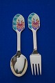 A. Michelsen Christmas spoon and Christmas fork 
2001 in gilded sterling silver