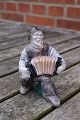 Michael Andersen Danish pottery, Bornholm. Fisherman plays accordion