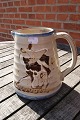 Knabstrup ceramics, Denmark. Large jug with a 
happy calf