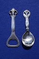 Danish solid silver flatware with stainless steel. 

Set of bottle opener and sugar spoon